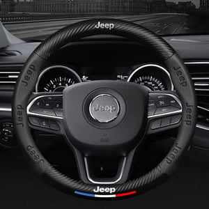 Steering wheel with Jeep logo in a car interior