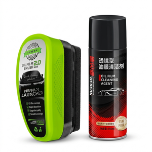 Car cleaning brush and oil film cleaning agent on a white background