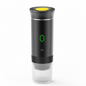 Black and clear electric wine bottle opener with a yellow button on a white background