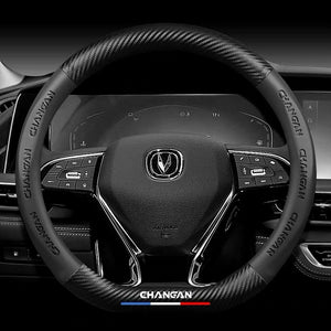 Steering wheel with 'Changan' branding on a car dashboard