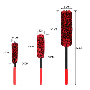 Red and black car cleaning brush with measurements on a white background
