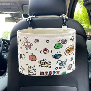 Car organizer with colorful designs hanging from a car seat