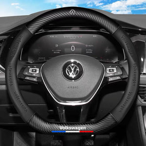 Steering wheel with Volkswagen logo in a car interior