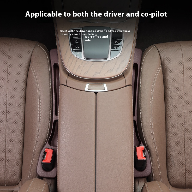 Car interior with beige seats and a central console, featuring text about driver and co-pilot use.