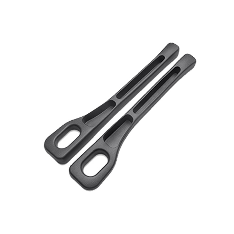 Two beige kitchen tongs on a white background