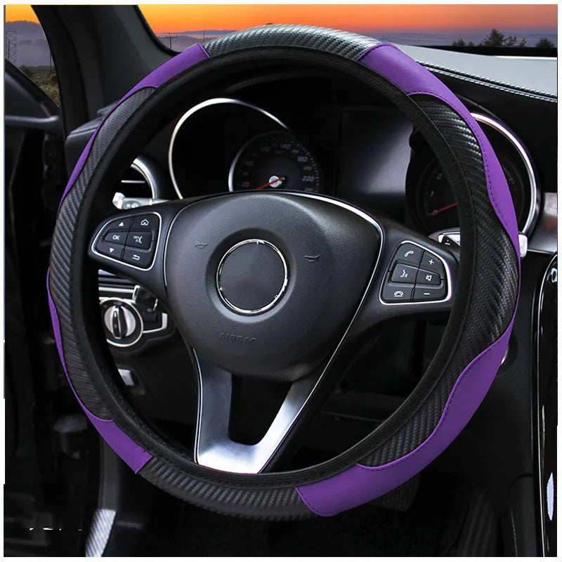Steering wheel cover with purple and black design on a car steering wheel