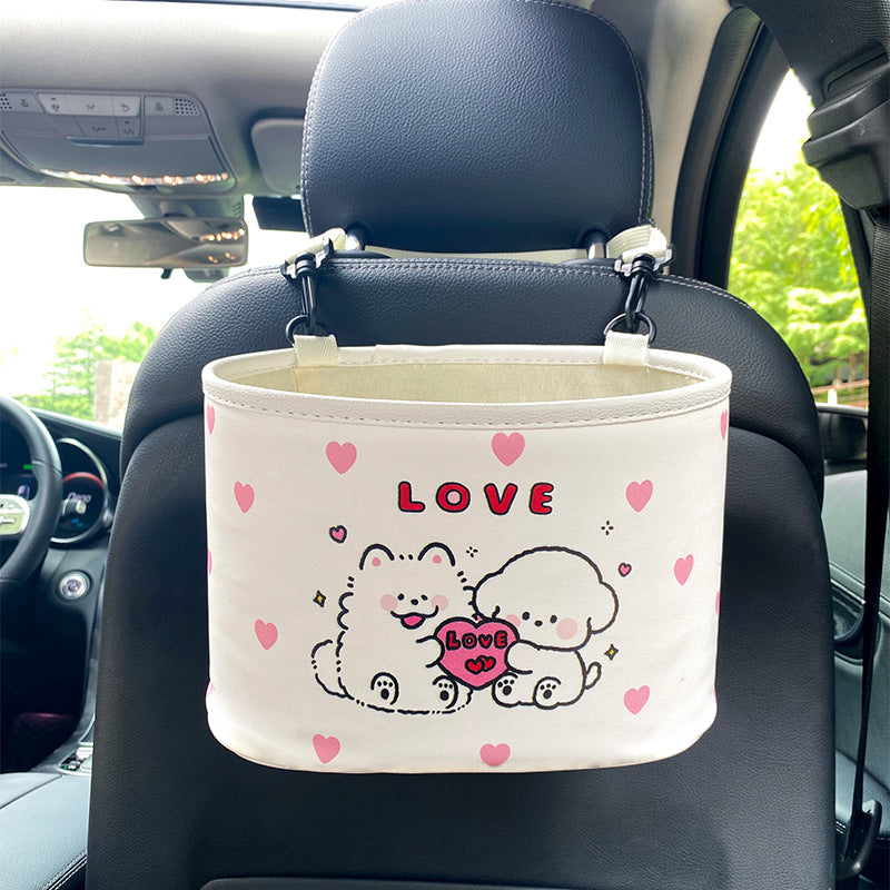 Car organizer with cartoon design and 'LOVE' text on a car seat.
