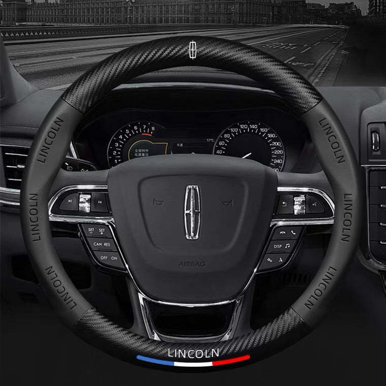 Steering wheel of a Lincoln car with dashboard in the background