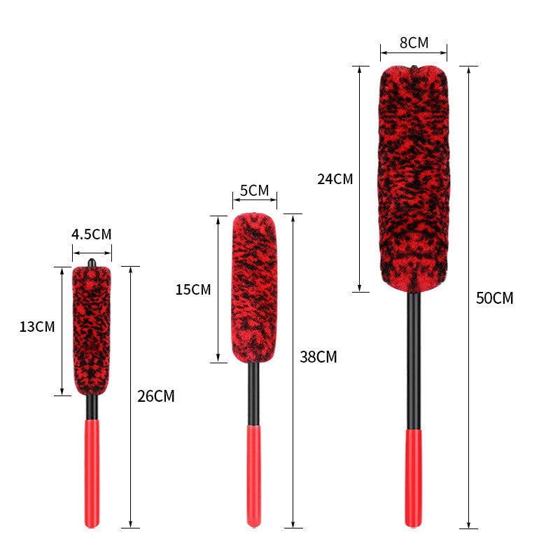Red and black car cleaning brush with measurements on a white background