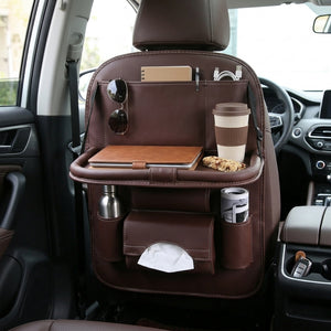 Car organizer with various items on a car seat