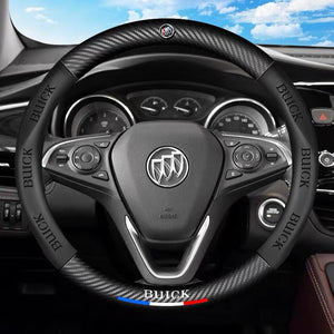 Steering wheel with Buick logo in a car interior