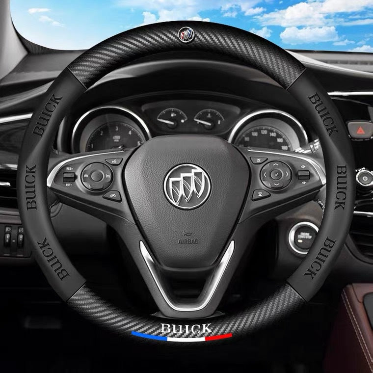 Steering wheel with Buick logo in a car interior