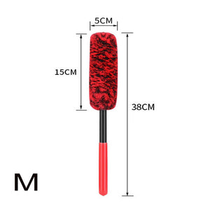 Red and black shoe brush with measurements on a white background