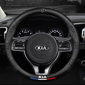 Steering wheel with KIA logo in a car interior