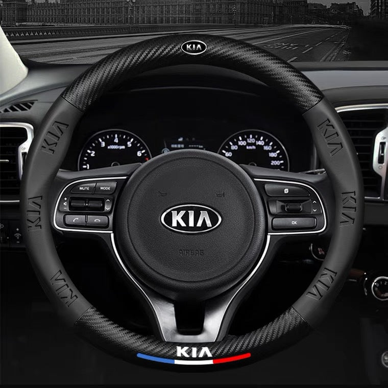 Steering wheel with KIA logo in a car interior