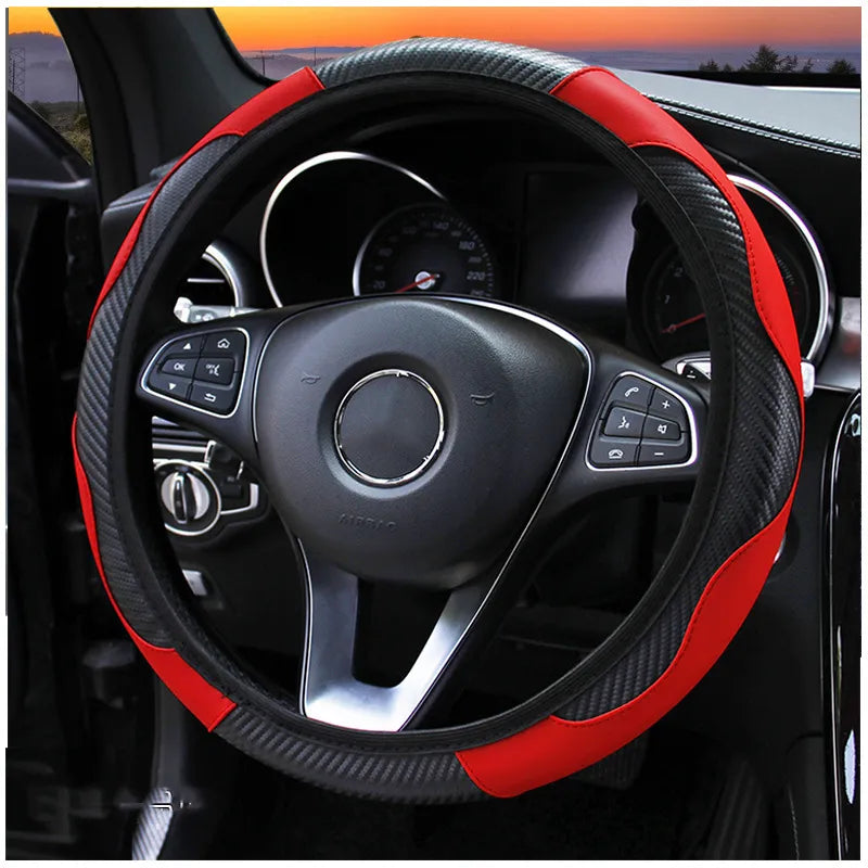 Steering wheel cover with red and black design on a car steering wheel