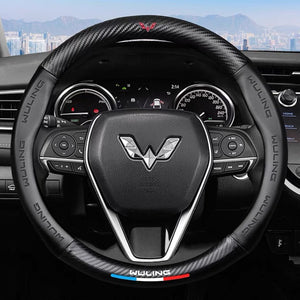 Steering wheel with Wuling logo in a car interior