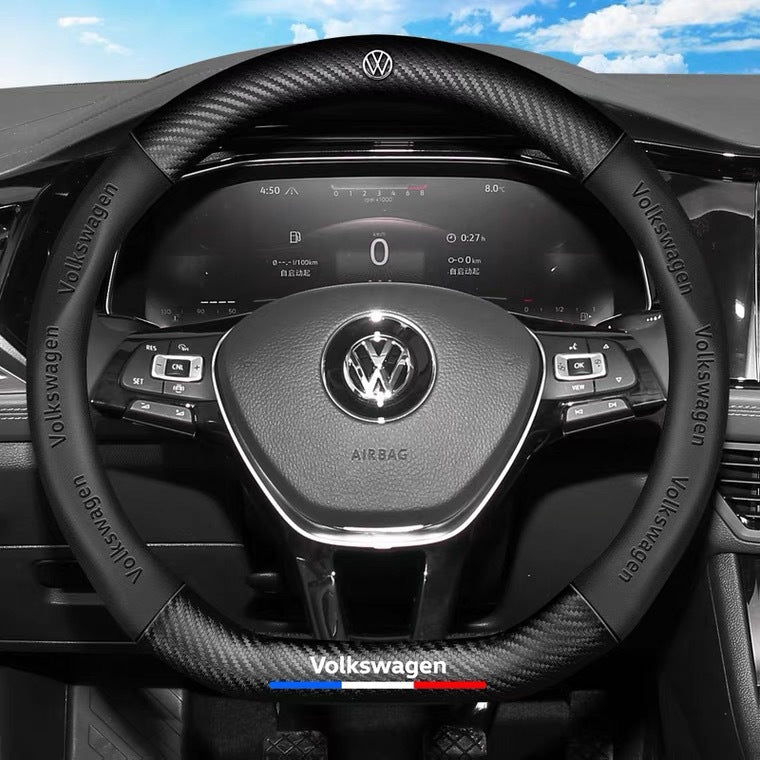 Steering wheel with Volkswagen logo in a car interior