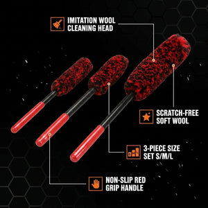 Three red cleaning brushes with black handles on a black background, labeled for features.